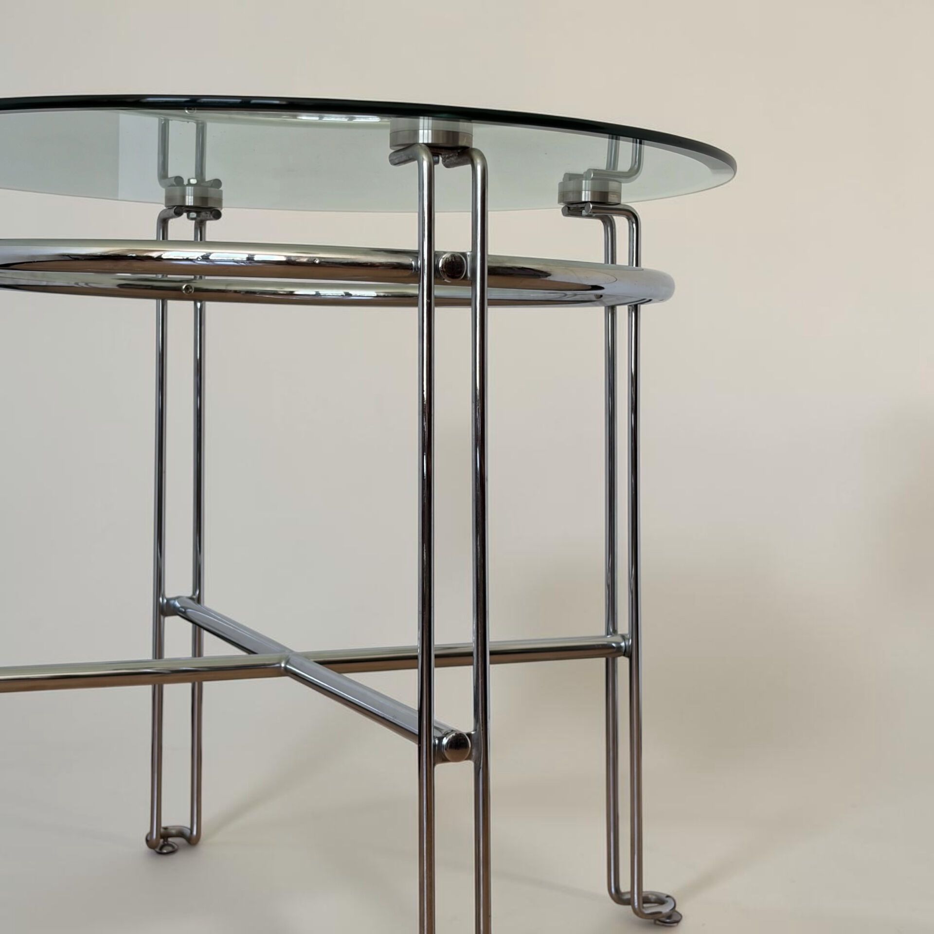 Chrome metal and glass tubular table