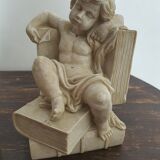 Angel bookends sitting in stone art deco 1950