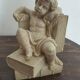 Angel bookends sitting in stone art deco 1950