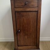 Vintage bedside table in the shape of a wooden column and a gray marble top