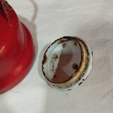red enamelled sheet metal kettle