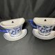 Set of white and blue porcelain flower cups from the early 20th century