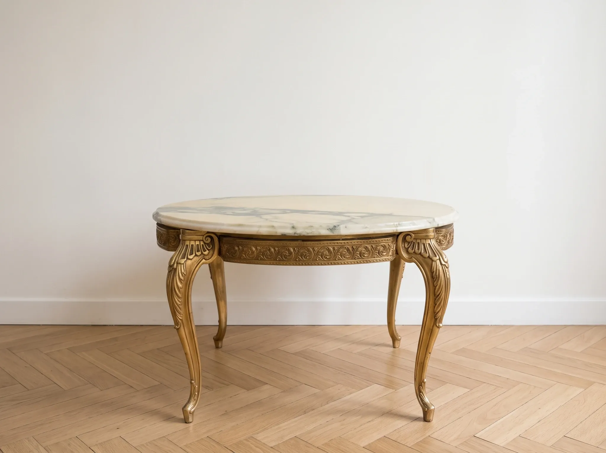 Baroque style coffee table with marble and gilded wood.