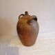 Old jar, glazed sandstone jug. Early twentieth century.