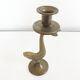 Old golden brass fish candlestick