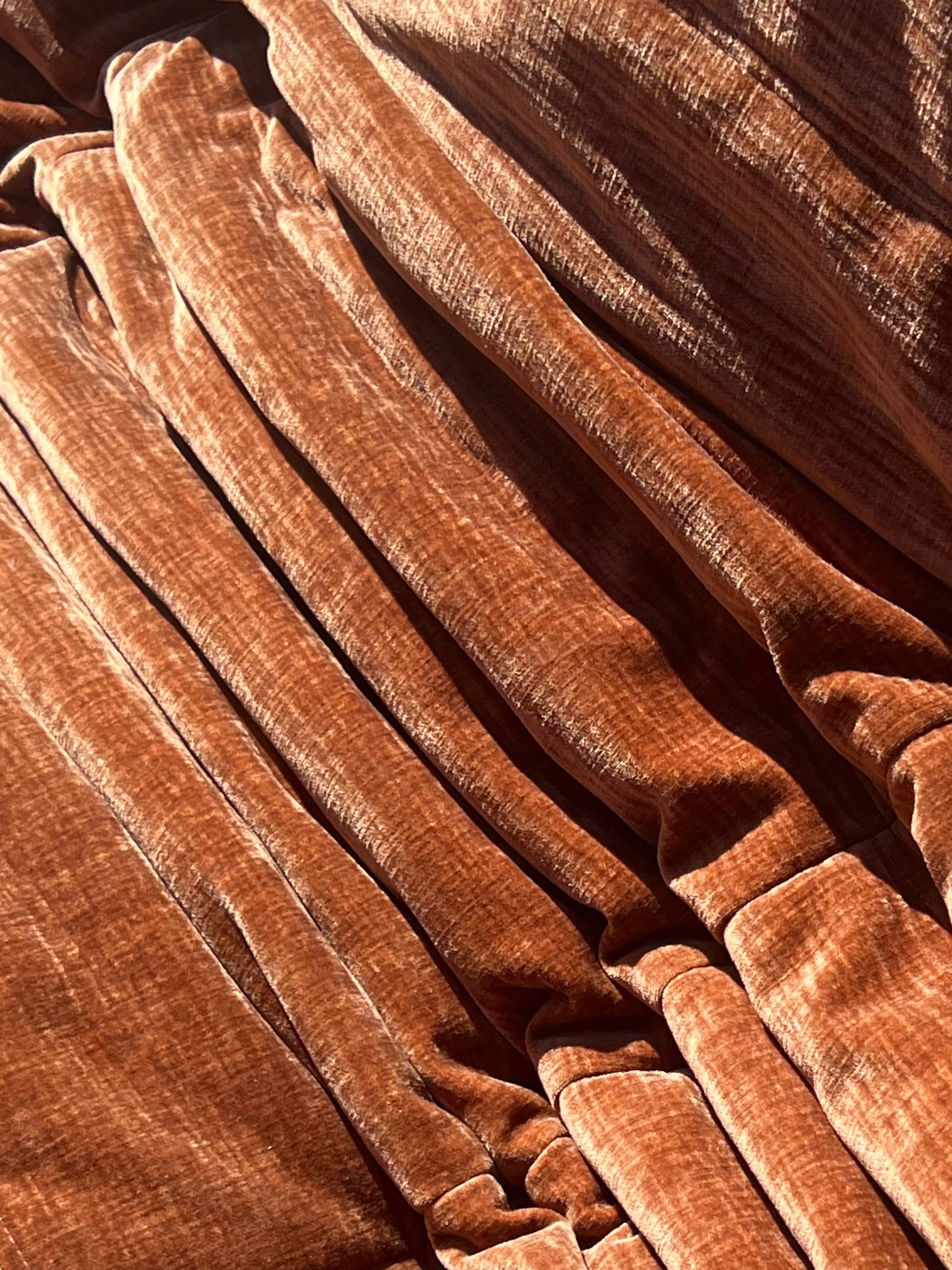 Two-seater Togo sofa in terracotta velvet, Ducaroy first edition 1970.