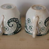 Pair of iron earth cups
