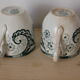 Pair of iron earth cups