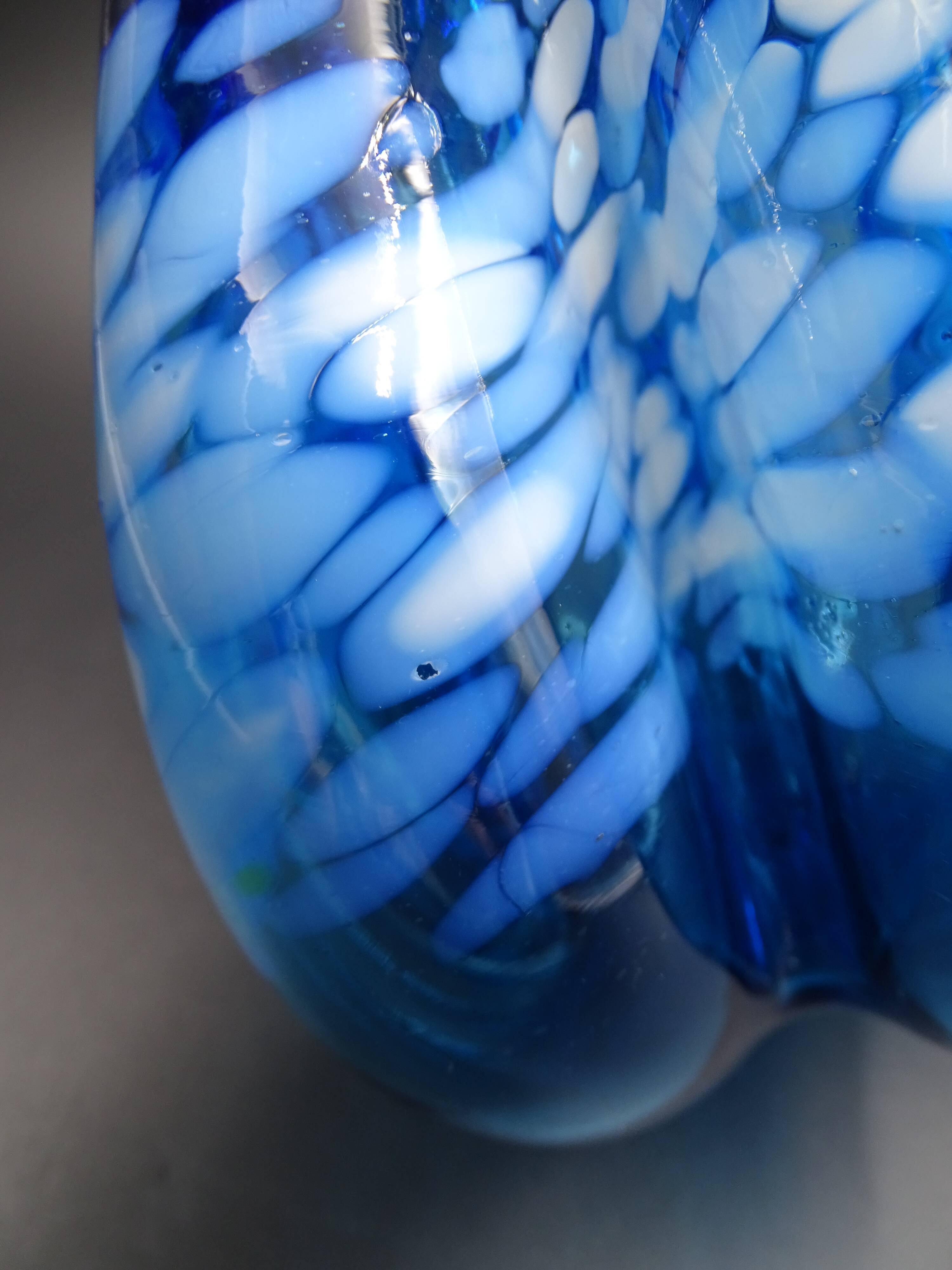 Blue glass vase and touches of white