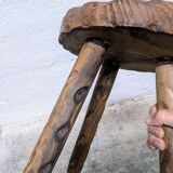 Carved wooden tripod stool