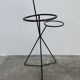 Black metal tripod plant holder