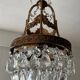 Old bronze basket chandelier with tassels