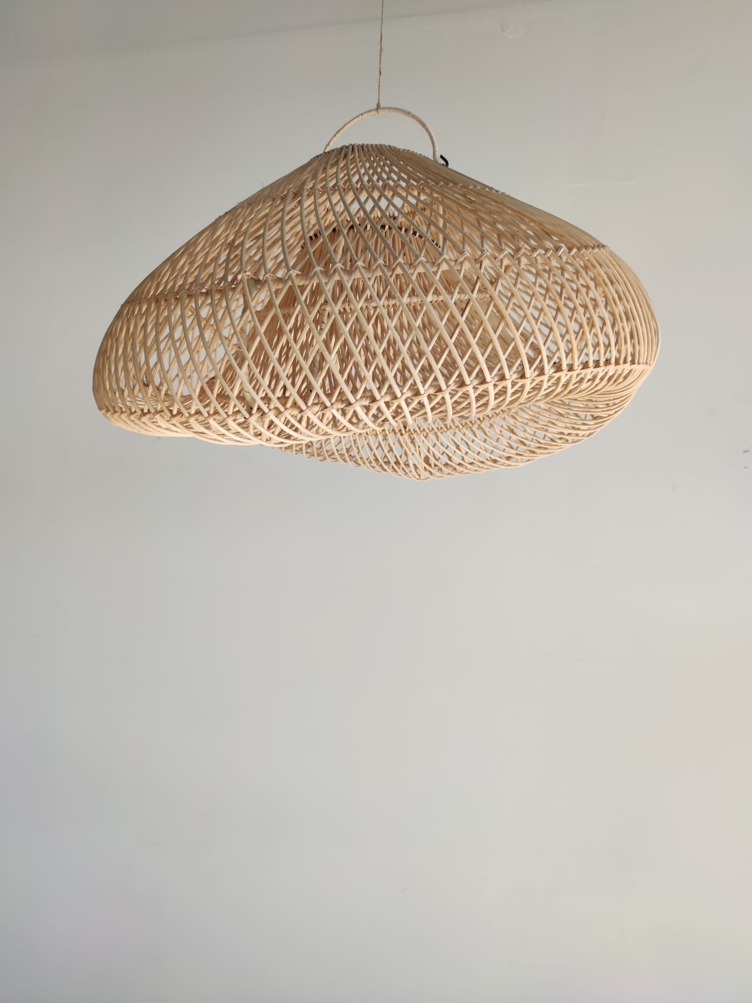 Small rattan lampshade in the shape of a braided hat