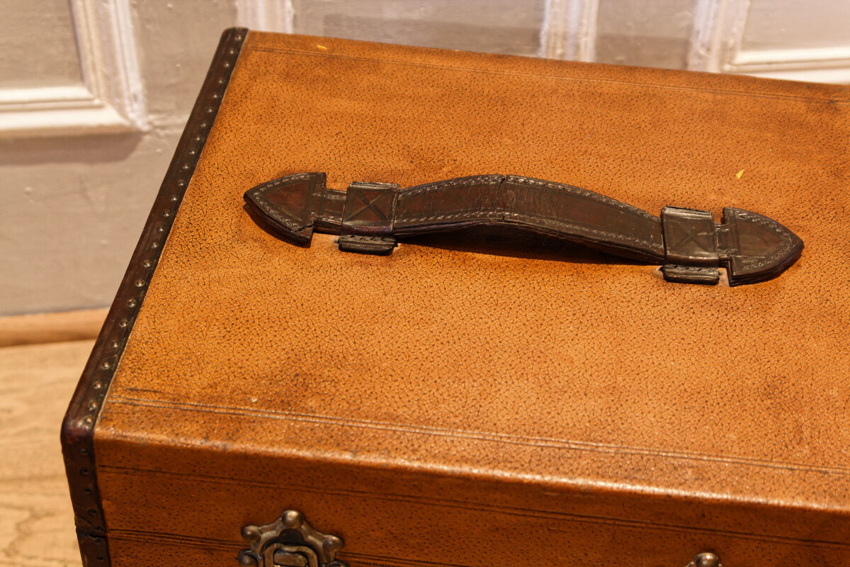 Leather and brass hat malle