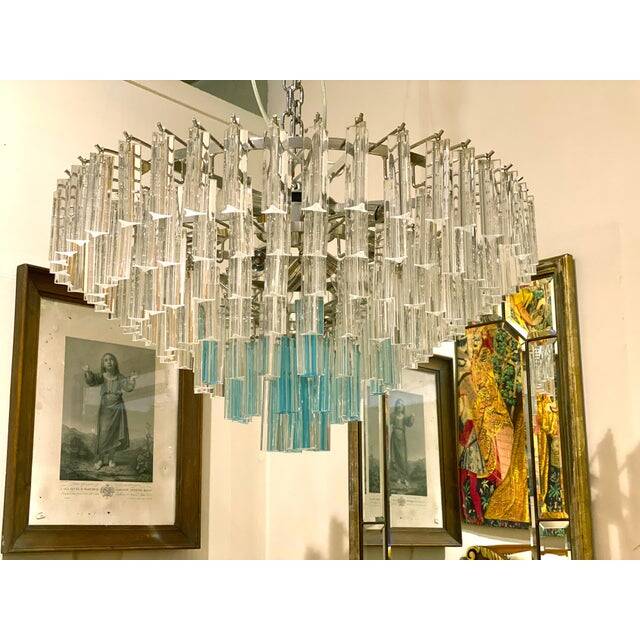 Contemporary transparent and ligh-blue triedro murano glass chandelier