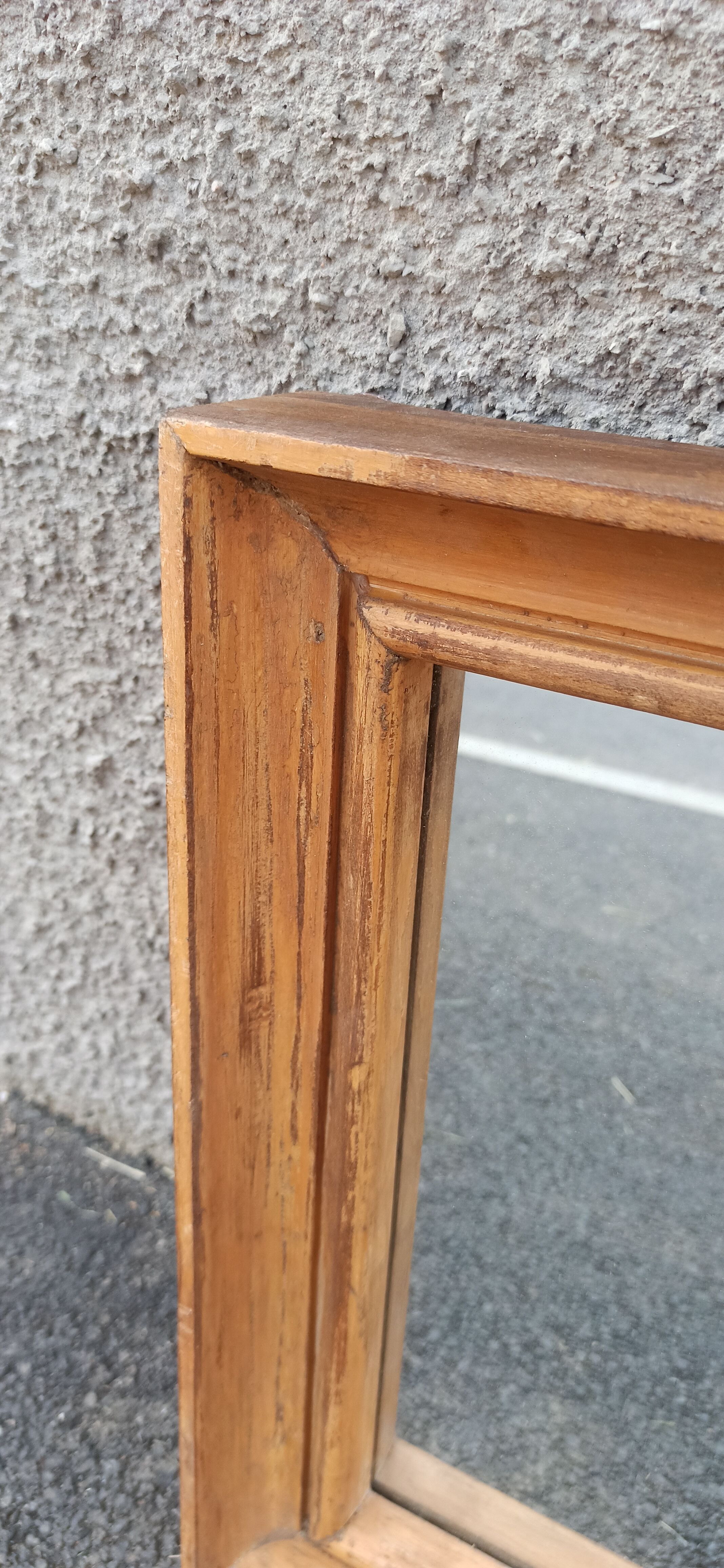 Square mirror in old wood