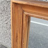 Square mirror in old wood