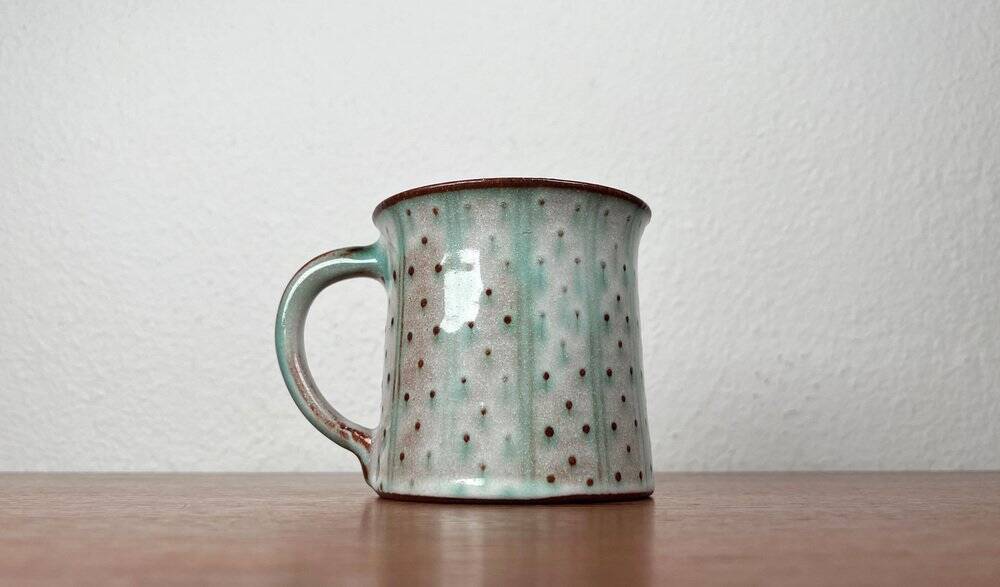 Mid-century modern studio pottery mug by Monika Maetzel, 1960s.