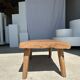 Coffee table in blond teak quadripod