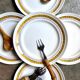 5 St Amand flat plates in yellow and gold earthenware