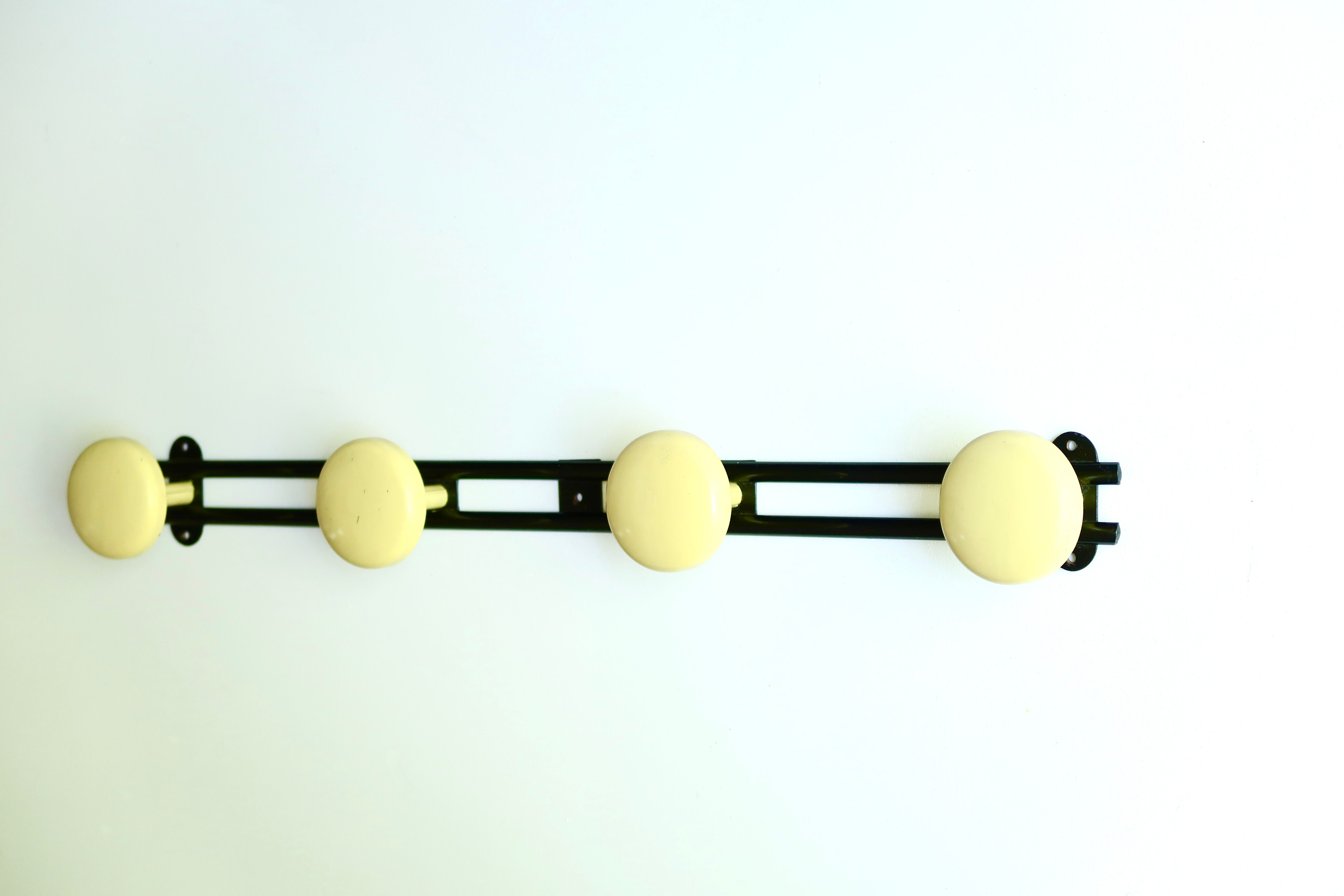 Black and yellow metal coat rack, 50s