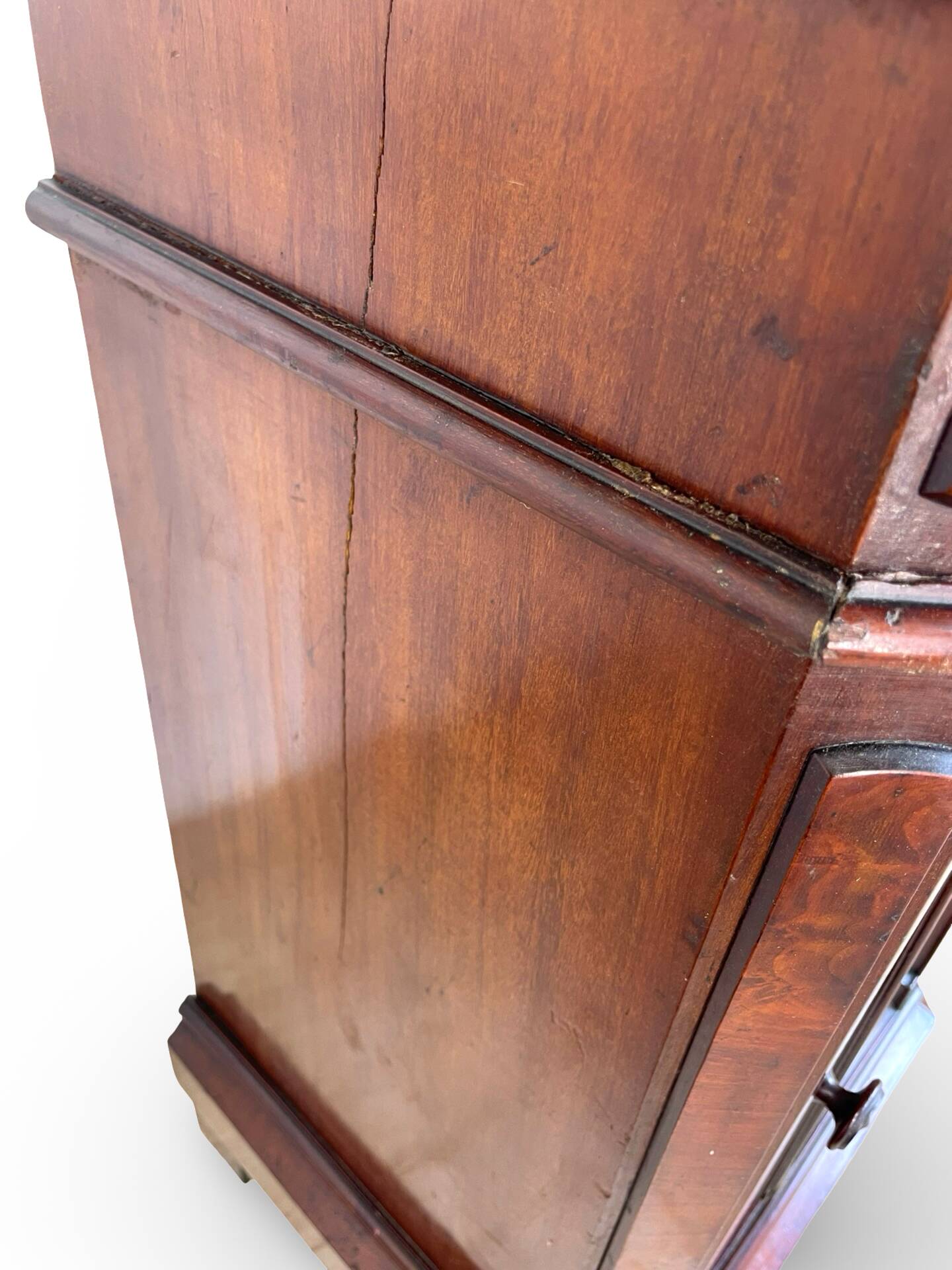 A pair of antique walnut bedside tables from the 1890s.