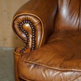 Captain's chair Chesterfield vintage leather with tufted wingback.