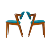 Pair of 42 Kai Kristiansen teak chairs in original blue bouclé upholstery, Denmark, 60s.