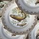 11 vintage Limoges porcelain fish plates