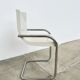 Pair of white moulded shell chairs with chrome tube — Space Age 70s