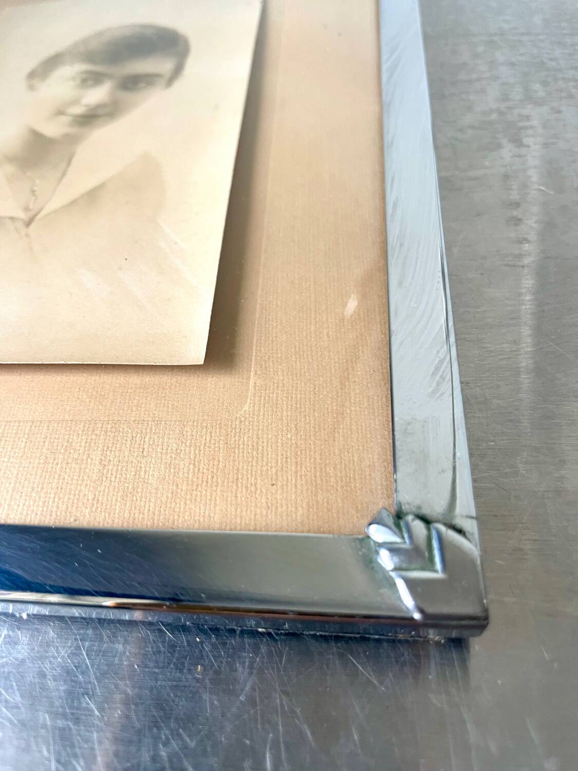 Art deco silver colored  metal frame  20.5  cm x 15.5 cm convex glass