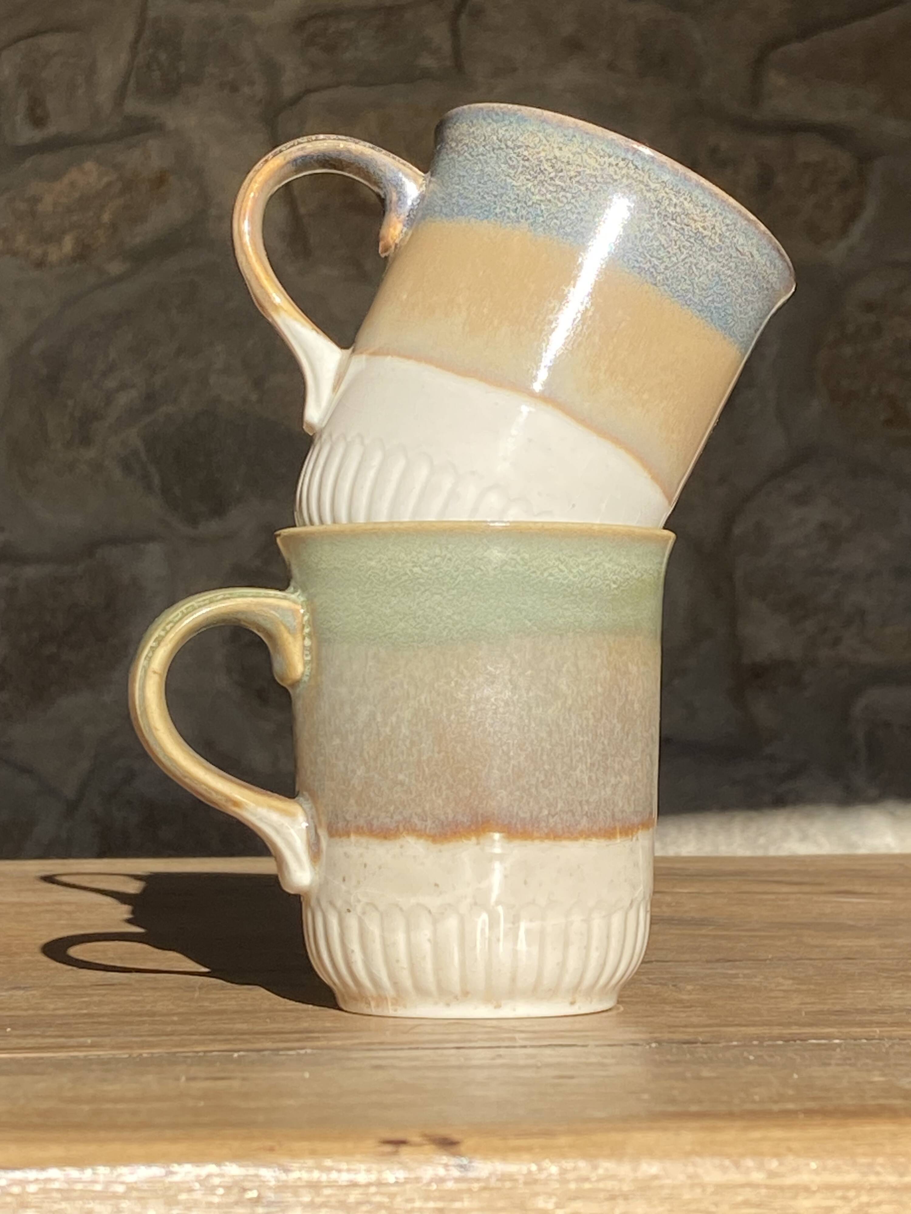 Two Staffordshire Mugs