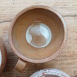 Stoneware coffee service, cups and saucers