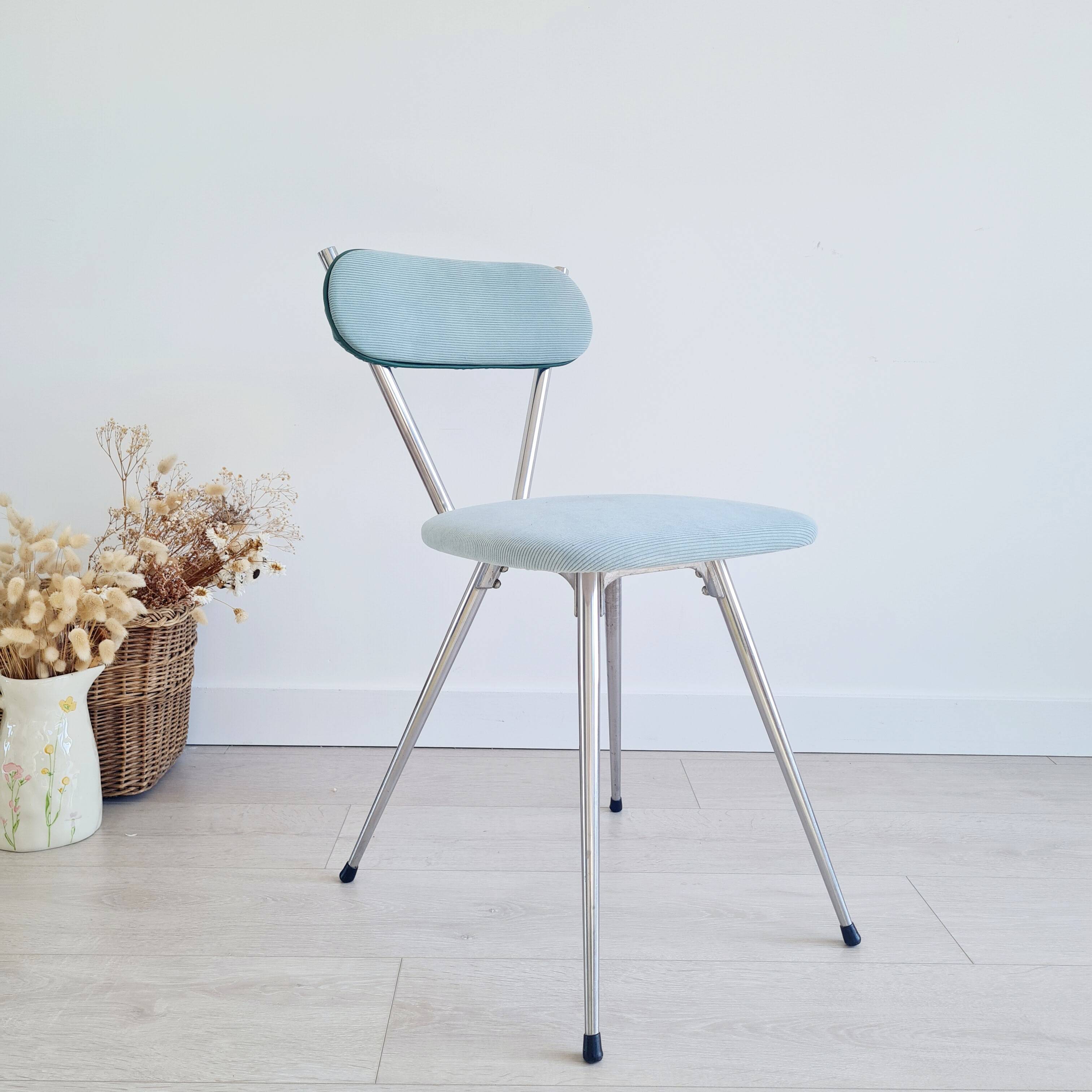 Old chrome metal and blue velvet chair
