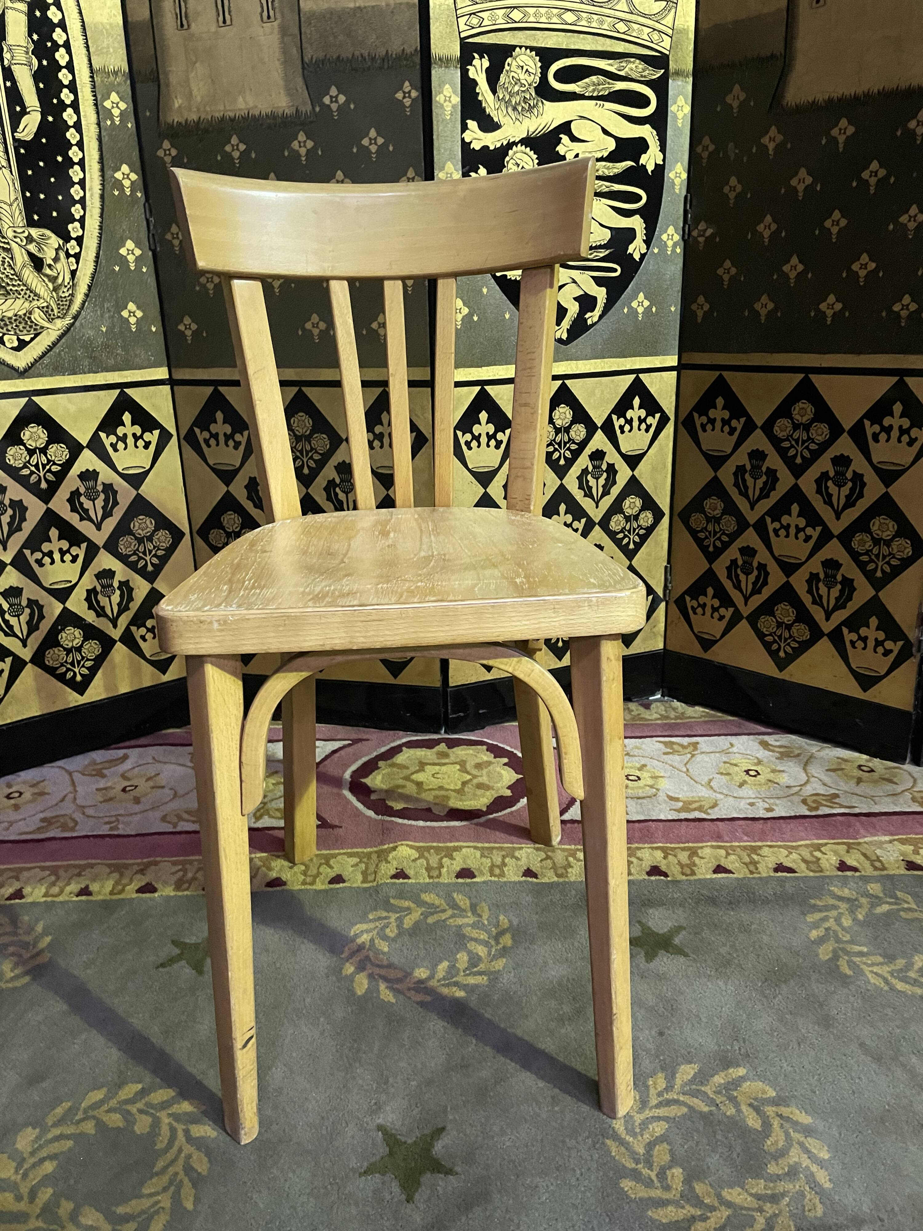 Suite of 6 bistro chairs signed "baumann"