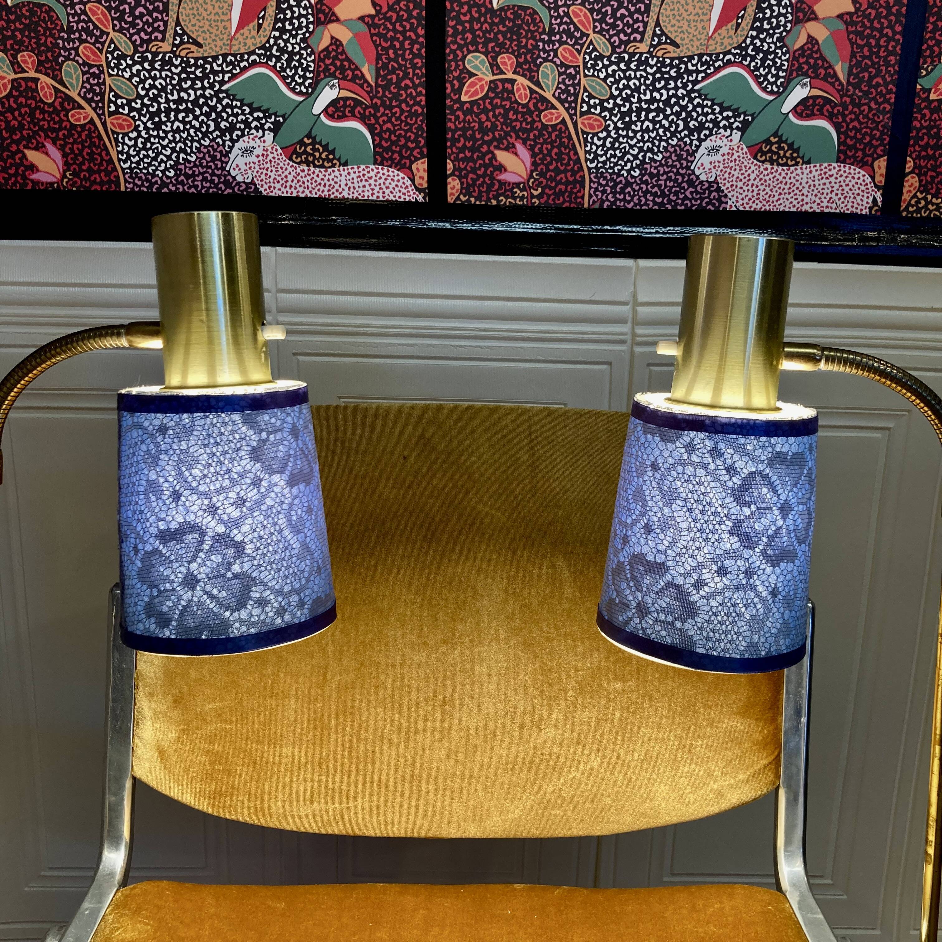 Pair of large modular industrial lamps from the 1950s.