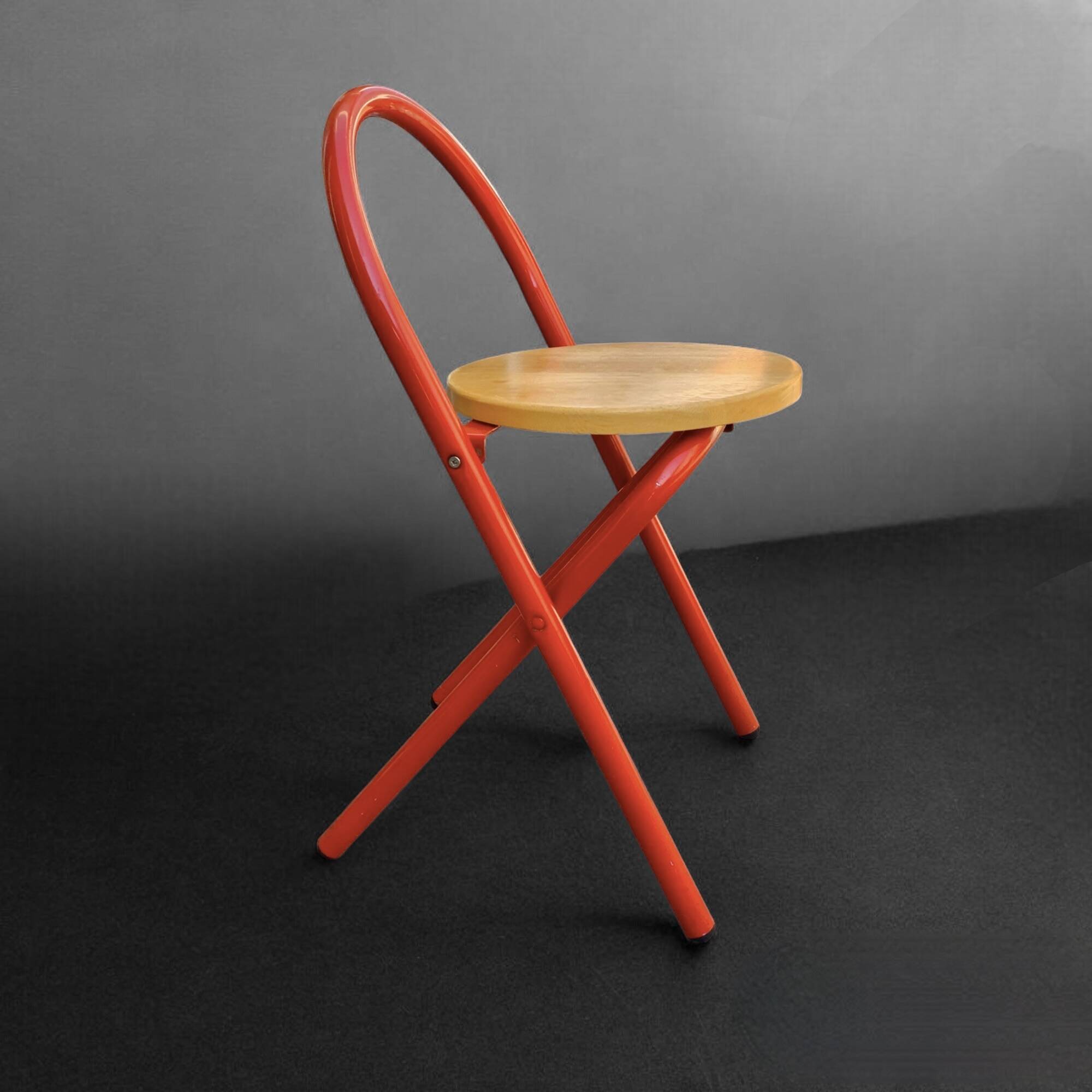Vintage folding chair in red painted metal and wood