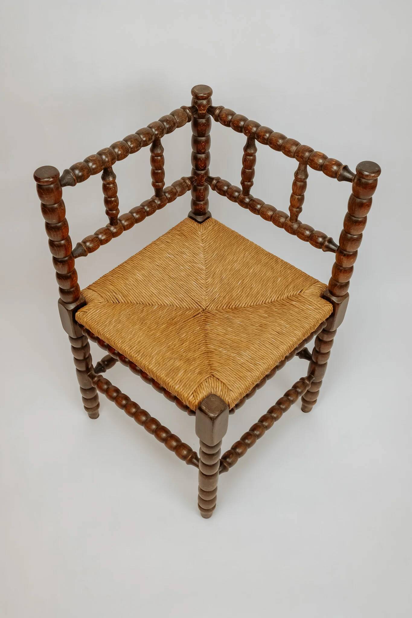 Classic vintage bobbin corner armchair