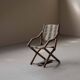 Foldable chair in solid wood and striped fabric, circa 1900.