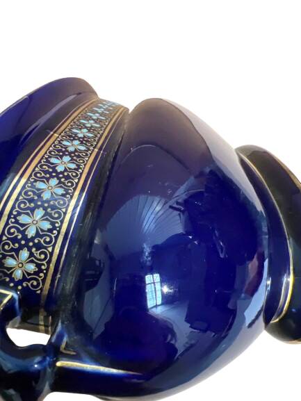 Blue earthenware planter decorated with gold motifs