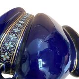 Blue earthenware planter decorated with gold motifs