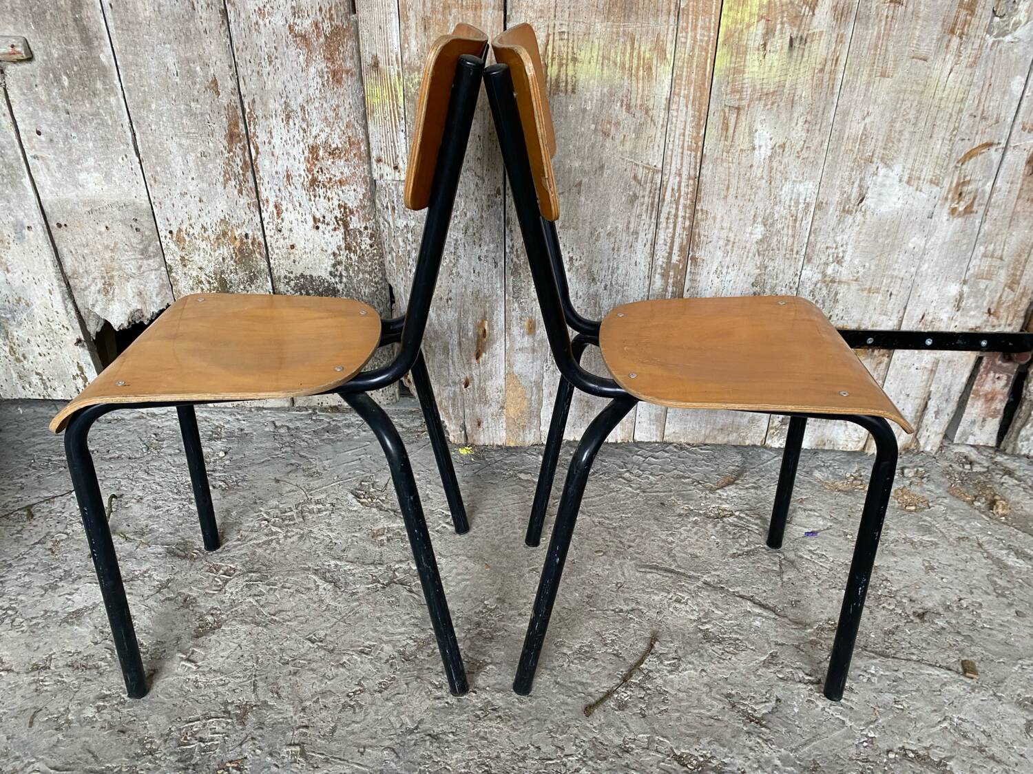 Pair of antique chairs in black metal + wooden seat & back