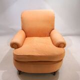 Deep seated armchair in the style of Howard & Sons