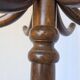 Vintage bentwood coat rack in Thonet style / Dark wood coat rack with shadow.