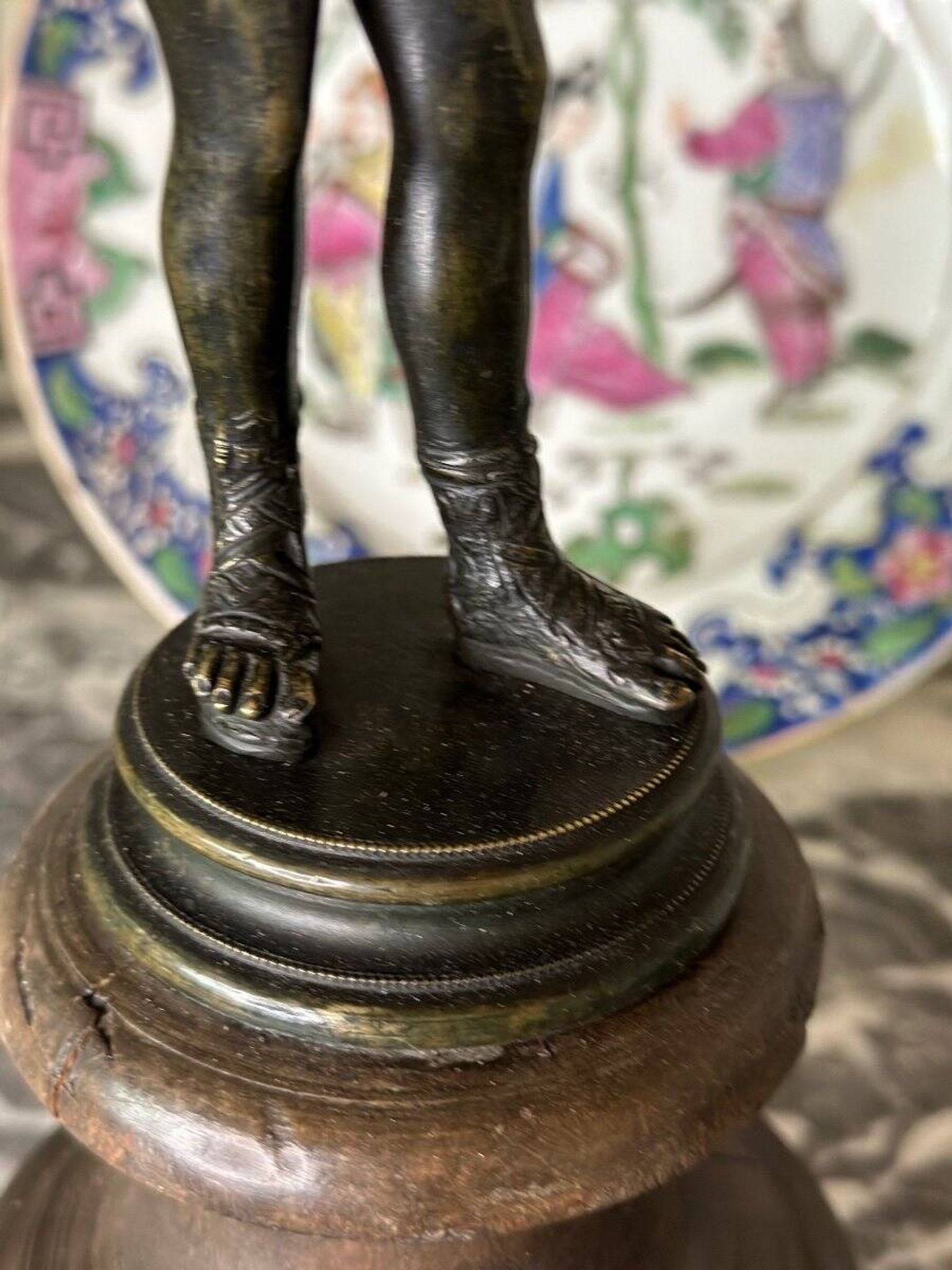 Narcissus, bronze after the antique on a wooden base, circa 1880.