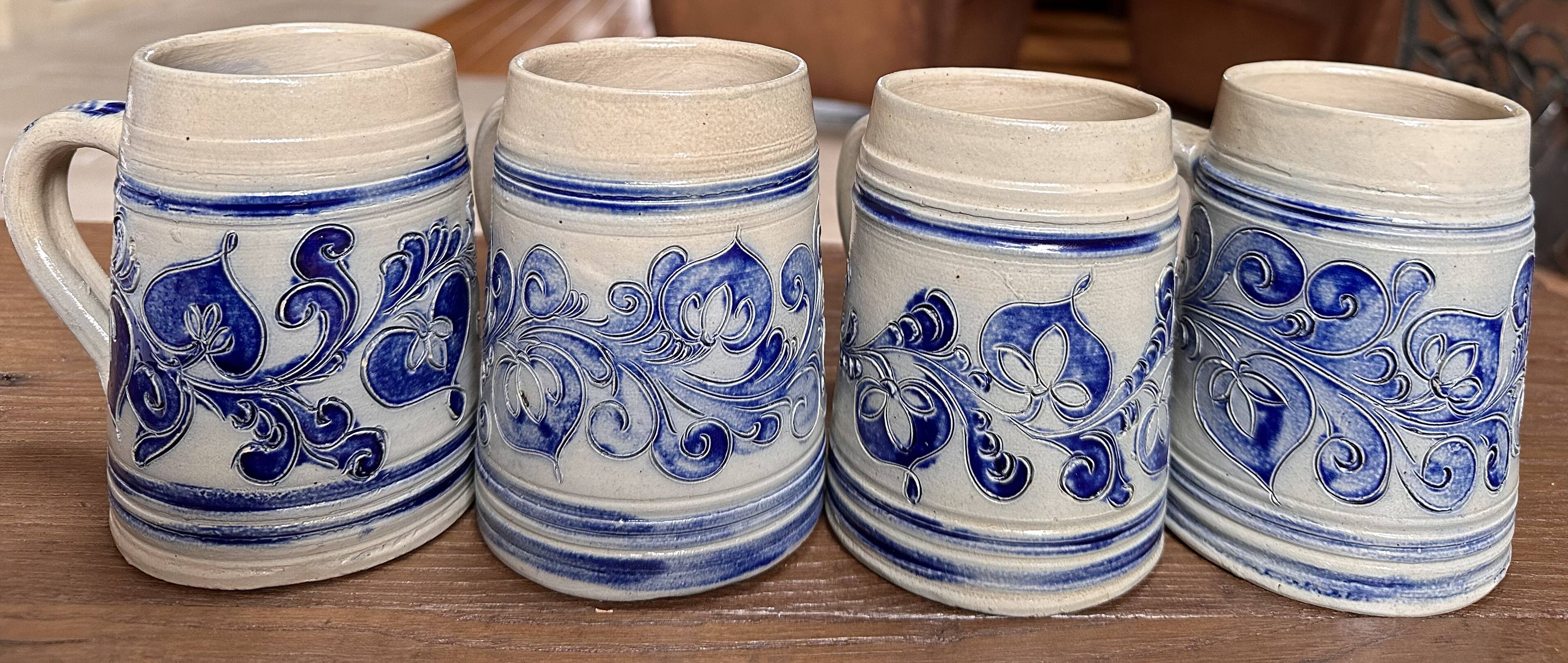 Lot of 4 Alsatian stoneware mugs signed Rémy Belsdorf.