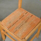 Set of six solid pine chairs by Maison Regain.