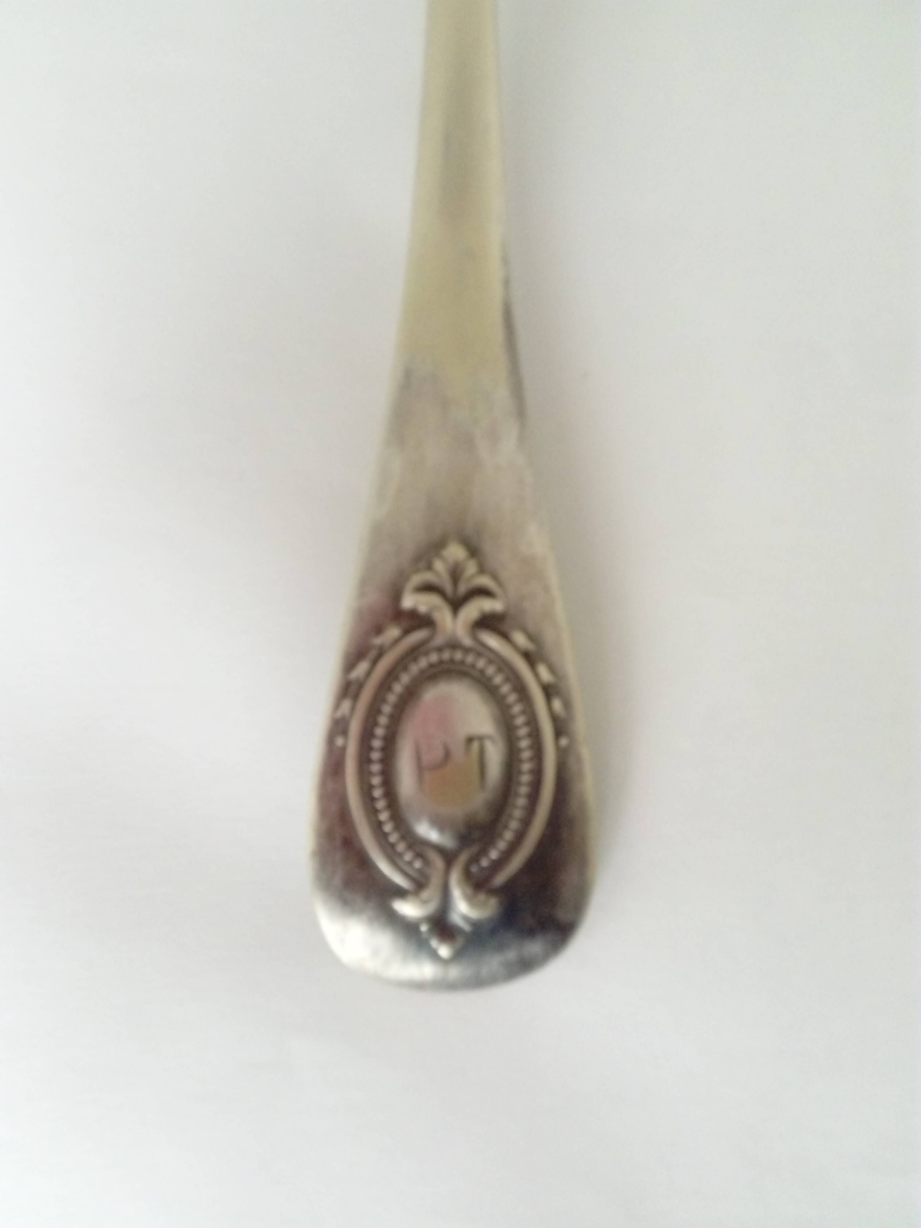 silver-plated metal ladle monogrammed PT orfevrerie L.Auzolle