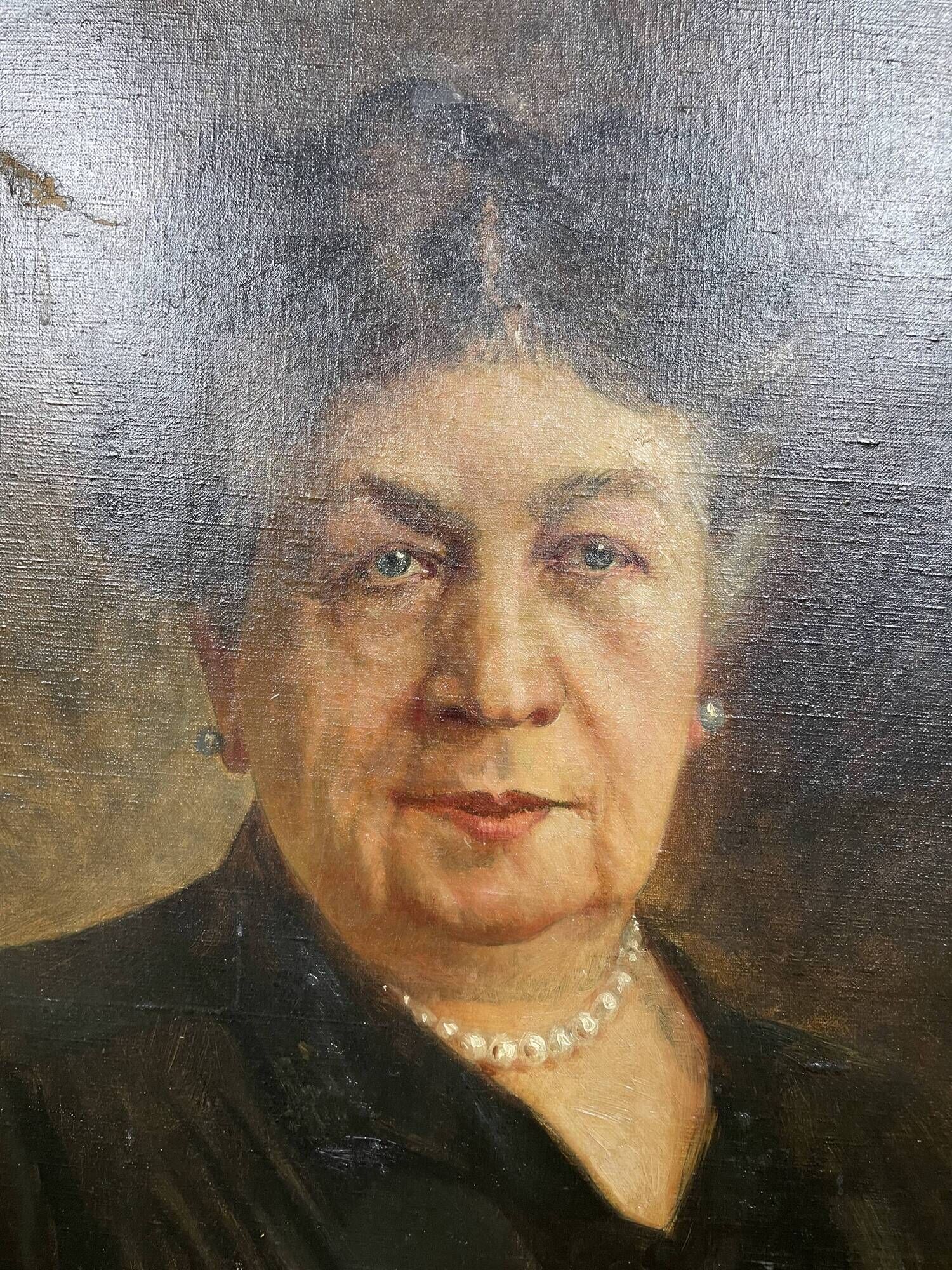 Oil on canvas portrait of a woman signed