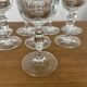 Set of 8 crystal champagne flutes in classic design.